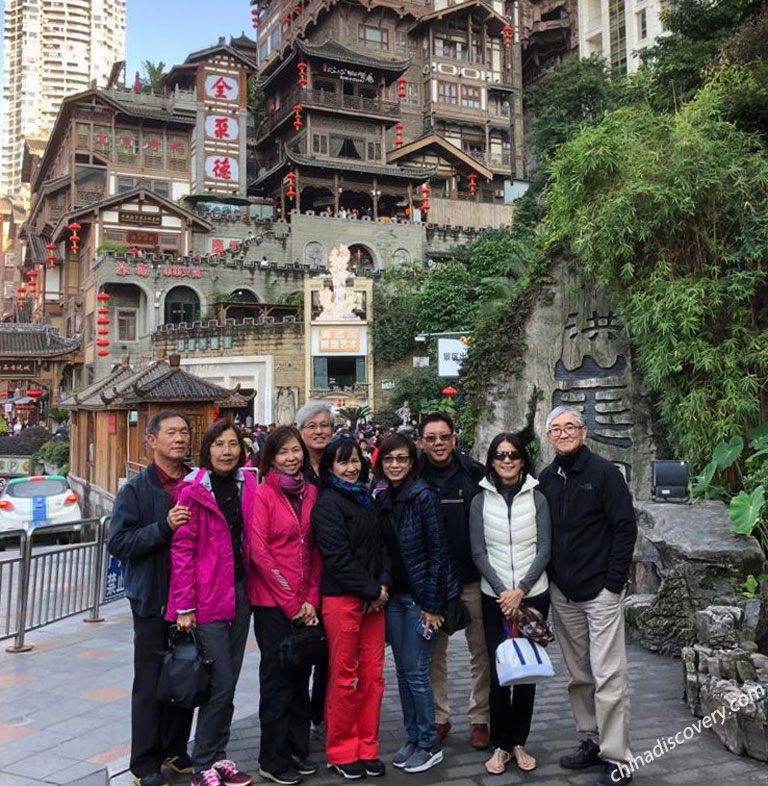 Our Guests Take a Photo with Hongya Cave How to Plan a China Yangtze Tour